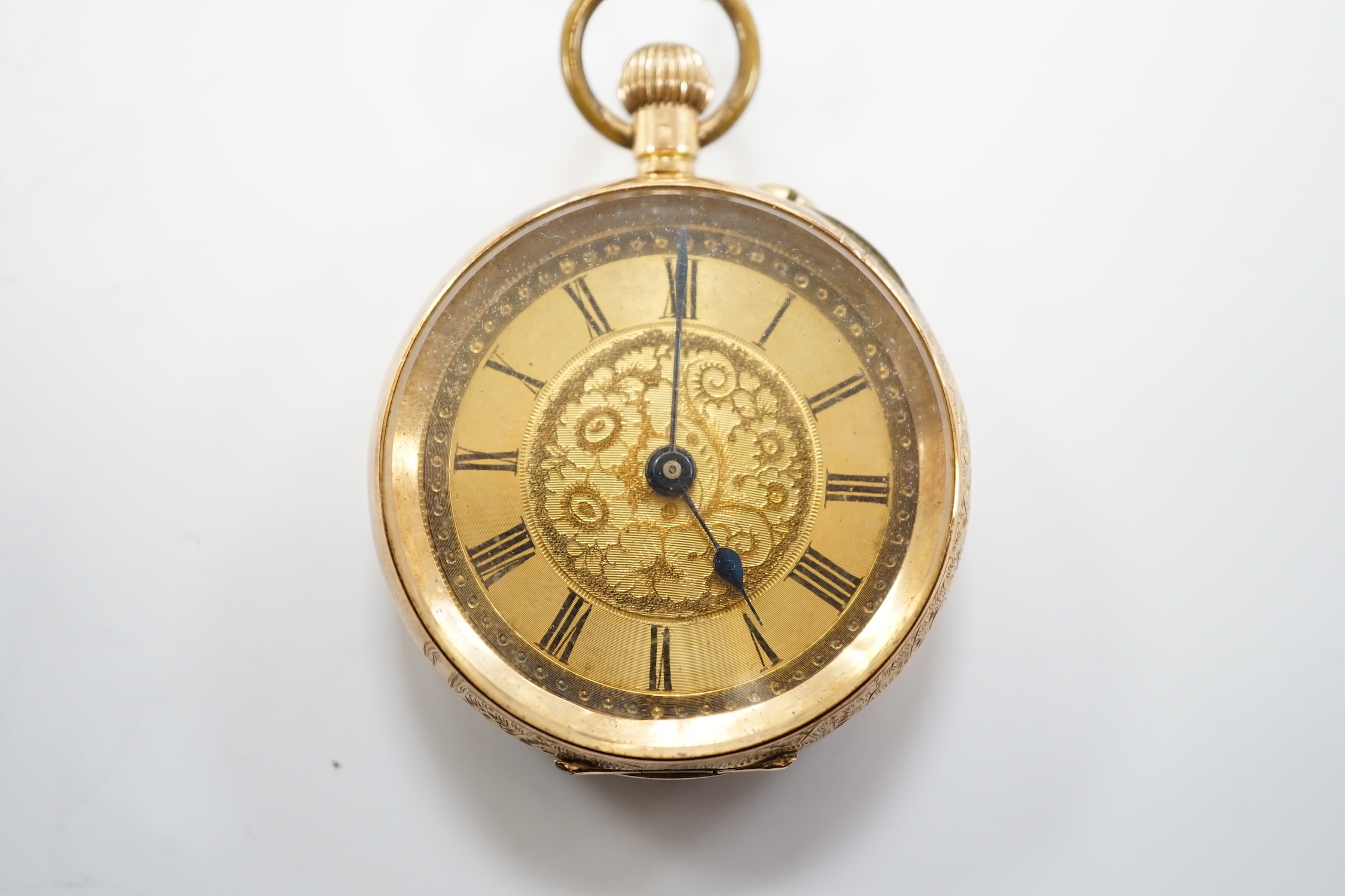 A continental 14k open face keyless fob watch, with Roman dial